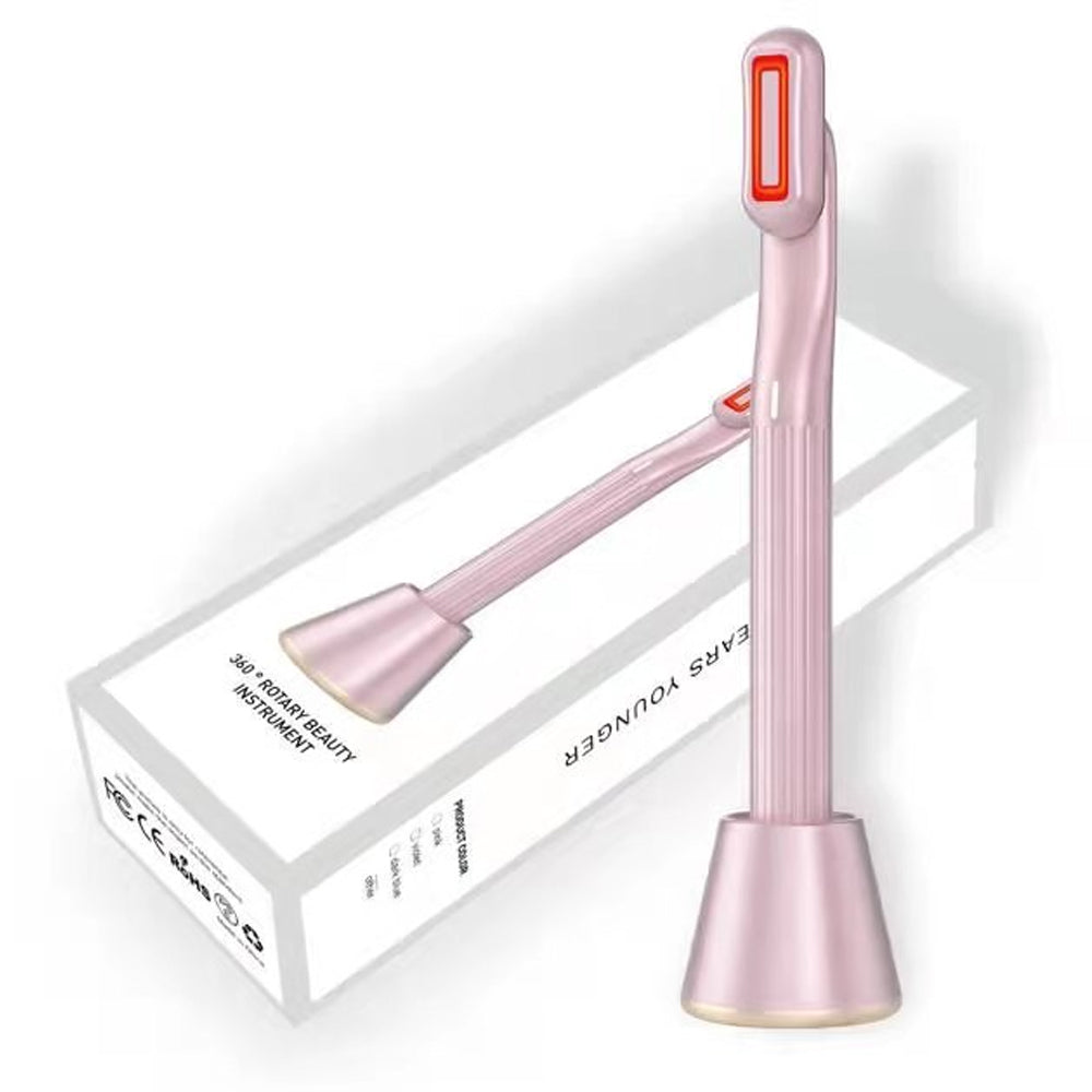 Pink Face Massage Device with charging base and product box for red light skincare routine