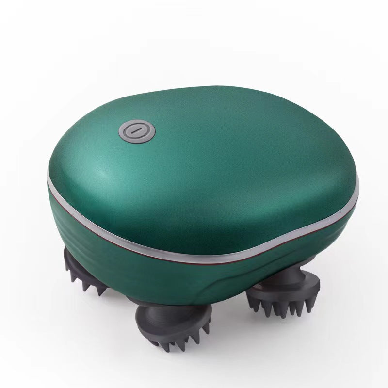 Green handheld massager with brush heads on a white background