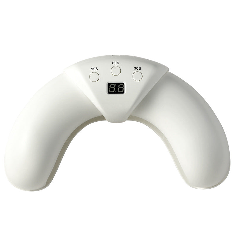 Portable gel nail curing lamp with compact folding structure