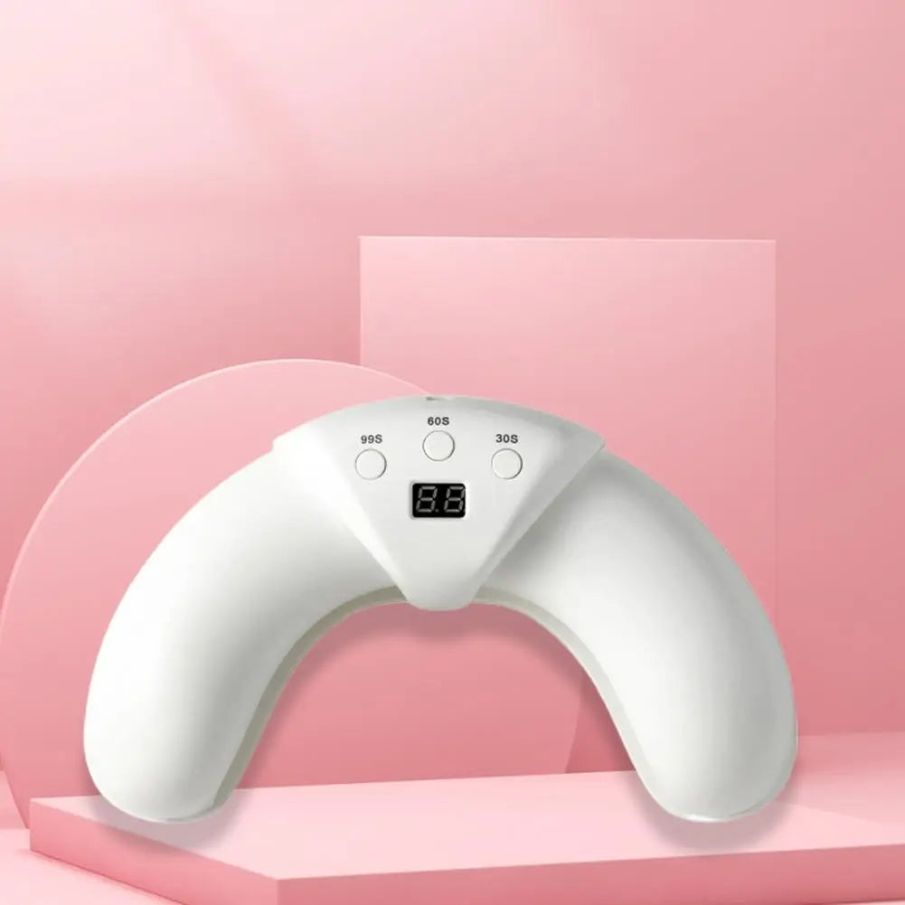Modern crescent shaped nail dryer for salon-style nail care
