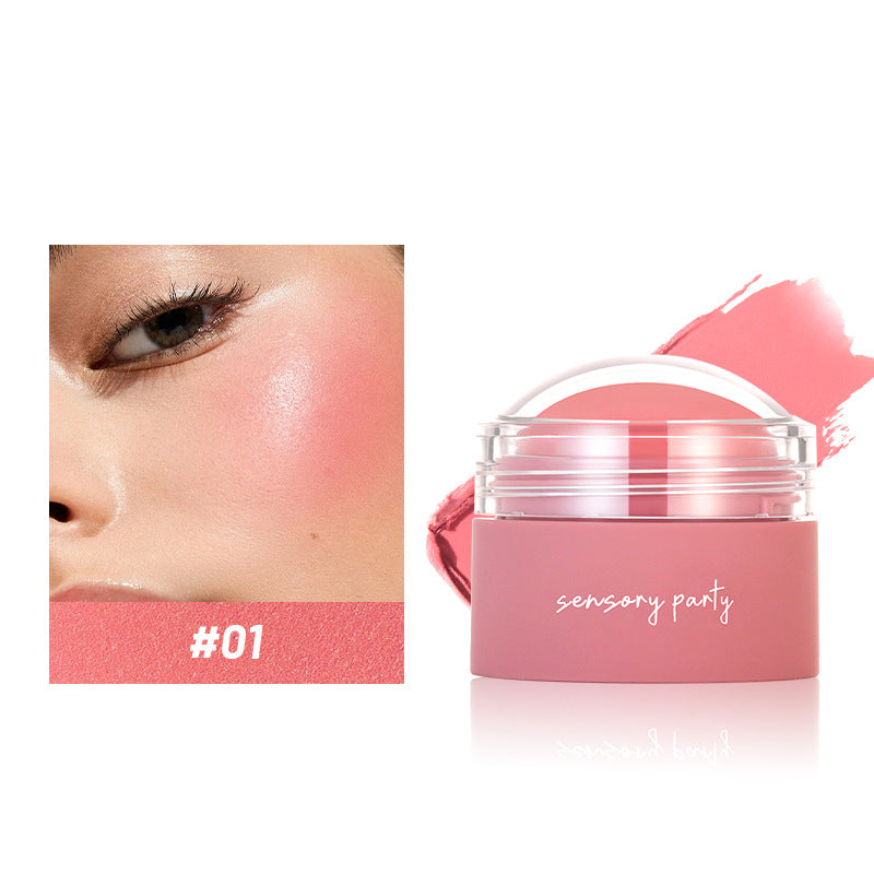 Pink cosmetic jar labeled 'sensory party' with a close-up of a person's face applying blush.