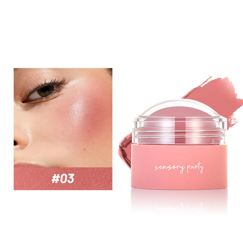 Pink cosmetic product with 'sensory party' branding and a swatch on a white background.