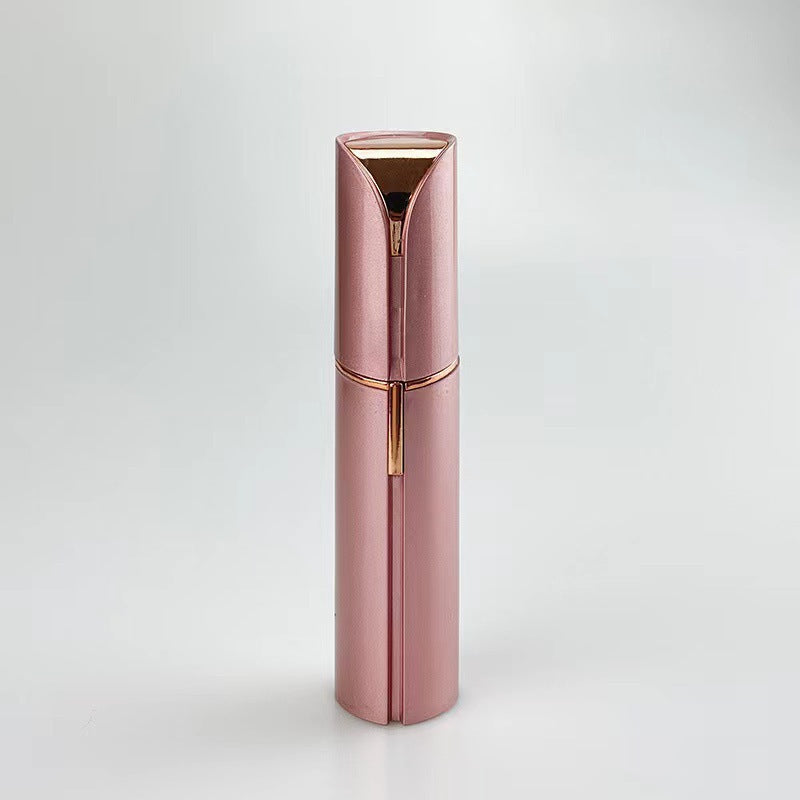 Rose gold cylindrical product on a light gray background