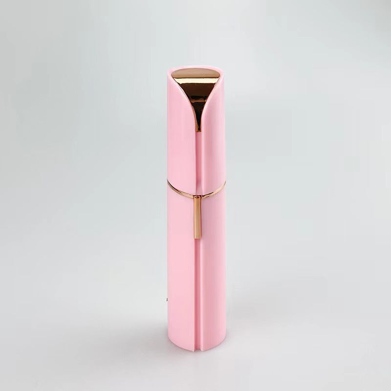 Pink electronic device with gold accents on a light gray background