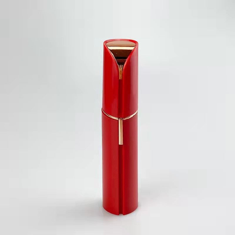 Red lipstick case with gold accents on a white background