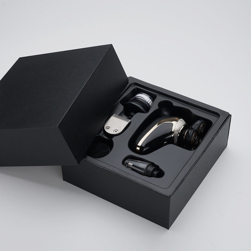 Portable electric razor with ergonomic shaving design